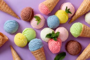 scoops of ice cream in pastel colors on a lavender background